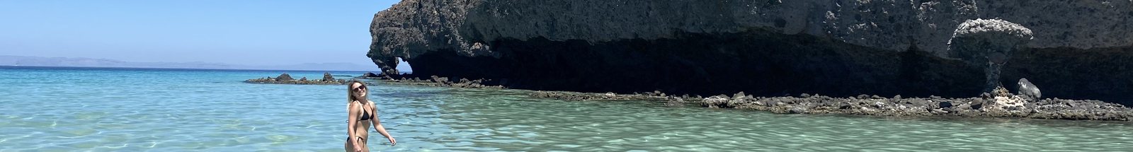 Clear turquoise water at Balandra with El Hongo, the mushroom rock