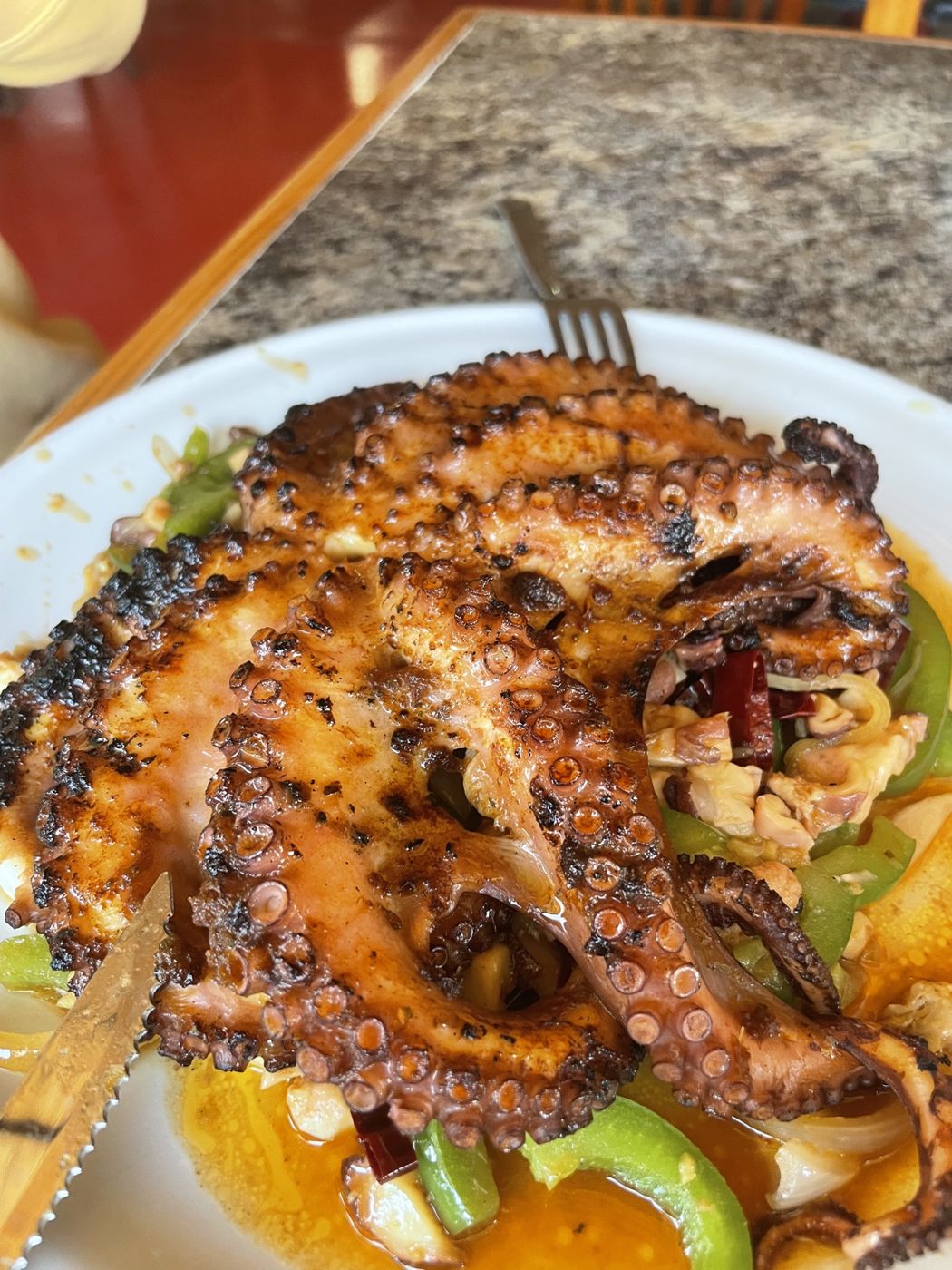 Pulpo zarandeado, grilled octopus, at Mariscos El Toro Güero, La Paz