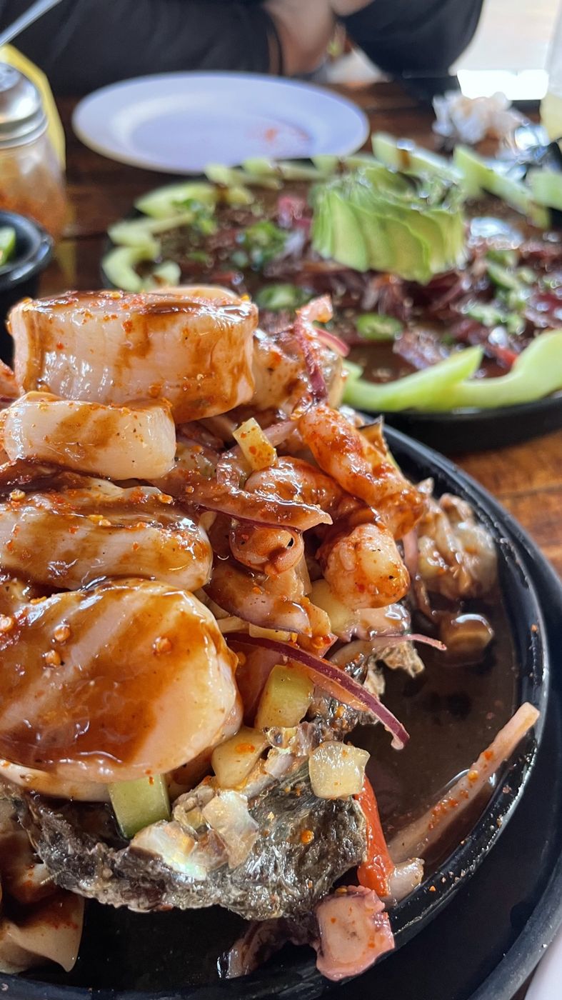 Scallops and shrimp in a dark chile sauce at El Paceñito, La Paz