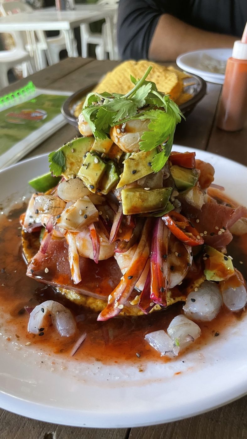 Tostada mixta with shrimp, tuna and avocado